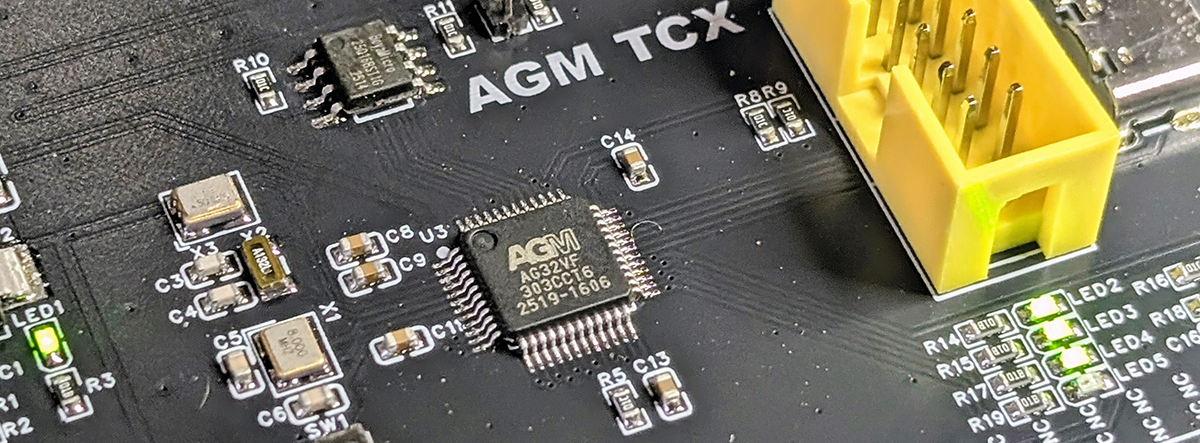 Banner image of the AG32 chip on a dev board