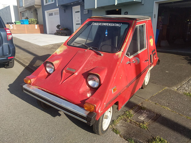 The car out of the garage